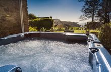 The hot tub at The Coach House at Moulthaven, Salcombe