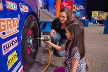 Changing tires in pit row of Hot Wheels™: Race to Win™ 