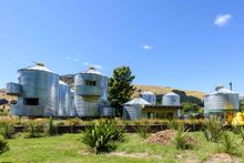 At Silo Stays metal silos, traditionally used to store grain, have been re-purposed as accommodation, and now loom above the hamlet of Little River, on Banks Peninsula, just south of Christchurch