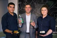 Jeremy Samuels, General Manager ibis Adelaide (centre) with James Stanley & Georgia Day presenting their 2017 National Reconciliation Week & NAIDOC week menu specials:  Braised Wallaby Shanks, Green Ant Gin & Desert Lime Martini & Saltbush Pavlova