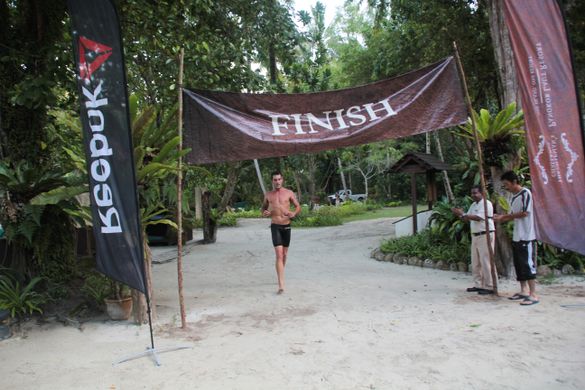 Overall champion - Reebok athlete, Redbull athlete and 2017 Surf Ironman, Matt Poole approaching the finish line
