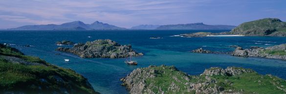 Looking over a bay on the Ardnamurchan peninsula to the Small Isles of Rum, Eigg and Muck.