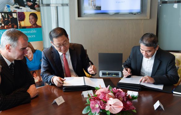 Mr Neo Soon Hup, Chief Financial Officer and Head of Business Development, Pan Pacific Hotels Group (centre) and Mr Tay Swee Eng, Deputy General Manager, PT China Sonangol Media Investment (right) at the signing ceremony for Pan Pacific Serviced Suites Ja Mr Neo Soon Hup, Chief Financial Officer and Head of Business Development, Pan Pacific Hotels Group (centre) and Mr Tay Swee Eng, Deputy General Manager, PT China Sonangol Media Investment (right) at the signing ceremony for Pan Pacific Serviced Suites Ja
