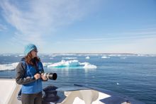 Photographer on board Polar Pioneer in the European Arctic