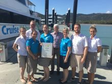 Proud employees. From left to right: Alya Palmer, Chris Dalgleish, Cody Fowler, Stacey-Leigh Messenger (holding award), Nick Hortle, Paula Brewer, Stephen Fitzpatrick and Blair Farmilo.