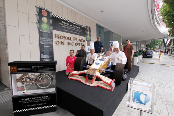 The talented team behind the life-sized recycled materials race car, Royal Plaza on Scotts