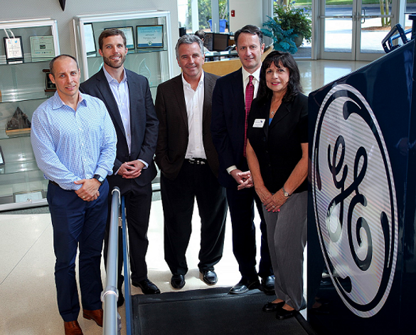 Melbourne Mayor Kathy Meehan joins GE Transportation and All Aboard leaders in touring GE’s local plant where the signal equipment for All Aboard Florida’s passenger-rail service will be designed and engineered. Pictured from left to right are: Keith Szew