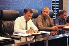 Mr Haris Mohamed, Acting Managing Director of MMPRC, and Mr Hussain Lirar, Deputy Minister of Tourism, sign the MMPRC Photography Ambassador Program.