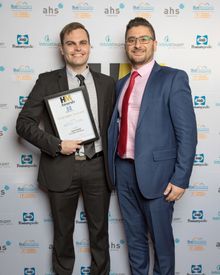 Jack Dahl, Next Hotel Brisbane winner of Front Office Associate (l.h.s.) receiving his award from Anthony Mitri, Director of Innovation, Industry, and Employability at the Blue Mountain International Hotel Management School.