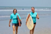 Suzanne Hart (right) is your host