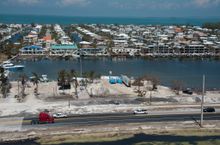 Traffic rolls on a repaired section of the Florida Keys Overseas Highway Tuesday, Sept. 19, 2017, in Islamorada, Fla. Storm surge from Hurricane Irma washed out a portion of the road Sept. 10, but a Florida Department of Transportation contractor repaired