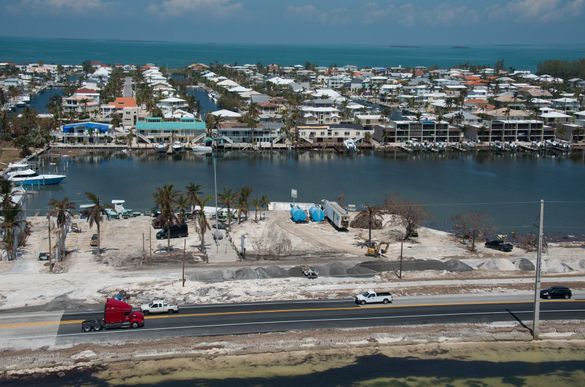 Traffic rolls on a repaired section of the Florida Keys Overseas Highway Tuesday, Sept. 19, 2017, in Islamorada, Fla. Storm surge from Hurricane Irma washed out a portion of the road Sept. 10, but a Florida Department of Transportation contractor repaired