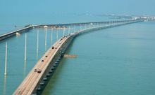 Traffic rolls on the Seven Mile Bridge near Marathon, Fla., Tuesday, Sept. 19, 2017. Early Tuesday, Florida Keys law enforcement officials discontinued a checkpoint near the top of the Florida Keys Overseas Highway after Hurricane Irma impacted the Keys S