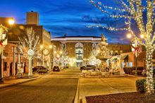 Clarksville's Strawberry Alley and fountain are adorned with holiday lights.