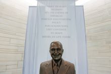 A statue of Harry Truman greets visitors at the Truman Library & Museum