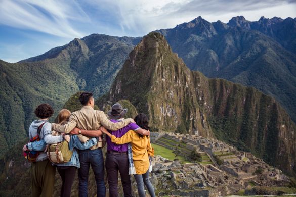 At the peak of the Inca Trail overlooking Machu Picchu