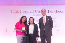 Mr. Bede Barry, General Manager of Conrad Macao (R) and Ms. Elinda Cheng, Vice President of Longines Macau (M) presents the fabulous La Grande Classique de Longines watch exclusively for Conrad Macao’s Pink Inspired Charity lunch