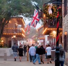 Pedestrians enjoy the beautifully lit St. George Street in St. Augustine during Nights of Lights. 
