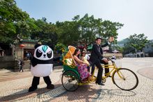Mr. Mark Chang, Chief Concierge of Sheraton Grand Macao and Soda Panda show off Macao to Mr. Saurabh Bakshi, GM of Operations for Sheraton Grand Macao and The St. Regis Macao, who recently moved to Macao along with his wife and their daughter. 