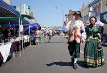 Town crier Ken Ashford and Carmel Murdoch dressed as Mary Heritage at the Maryborough Markets.