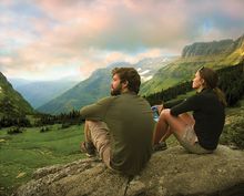 Hikers taking in the view from the Highline Trail near Logan Pass.