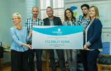 Katarina Line's Anamaria Hauptfeld (r) presenting check for donation
