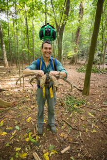 Alasdair with Google Trekker and a robber crab