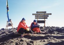 Two women summit Mount Kilimanjaro