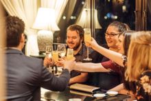 Guests enjoying cocktails before the Christmas Dinner