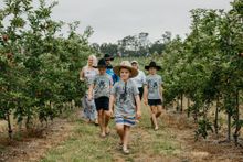 The Walsh family tour Lyster Orchard to see how the next season of BRAVO™ apples are progressing_photography credit Sophie Brockmann