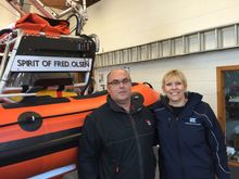 Fred. Olsen Cruise Lines' Rachael Jackson and Sandy Murray of Kyle of Lochalsh RNLI celebrate the two organisations' long-standing partnership, with Atlantic 85-class lifeboat 'Spirit of Fred. Olsen' 