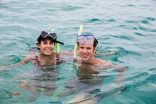 Ashleigh Gentle and Josh Amberger get ready to snorkel in the aquamarine waters off Tangalooma Resort on Moreton Island.