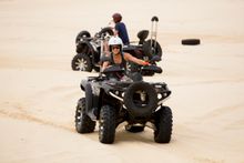 It's quad bike time in the huge sand bowl on Moreton Island