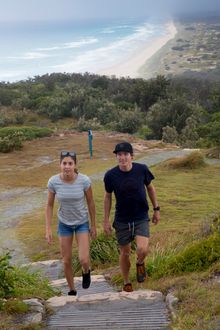 Ash and Josh walk up the stars to Cape Moreton to see the lighthouse and historical museum as part of their camping getaway ahead of the Gold Coast Commonwealth Games in April.