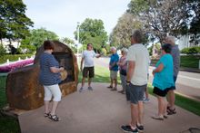 Bombing of Darwin WWII Tour outside Government House, Darwin with Tour Guide Garry Gallagher
