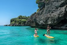 Shangri La Boracay guests paddle boarding 