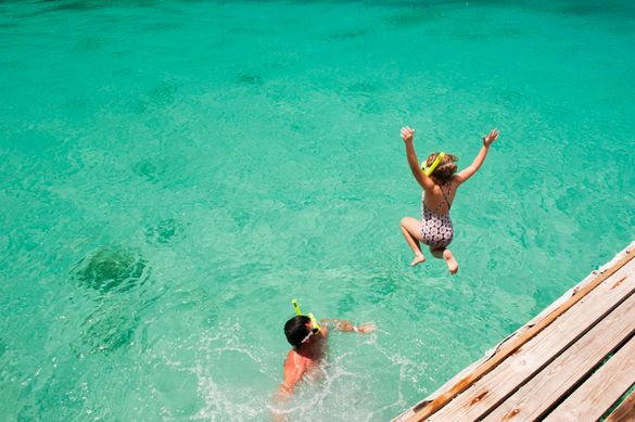 Child Jumping Off Jetty Child Jumping Off Jetty