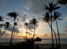The sun begins to rise over the Atlantic Ocean Sunday, Oct. 1, 2017, in Islamorada, Fla. 