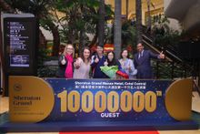 Ms. Janet McNab, Managing Director of Sheraton Grand Macao Hotel and The St. Regis Macao, and senior executives celebrate the arrival of the 10 Millionth Guest, Mr. Yan and Ms. Liu from Hangzhou