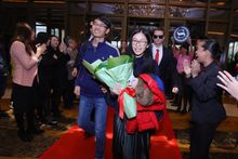 The lucky 10 millionth guest, Mr. Yan Ling and his guest, Ms. Liu were greeted with a red carpet welcome upon arrival at the hotel