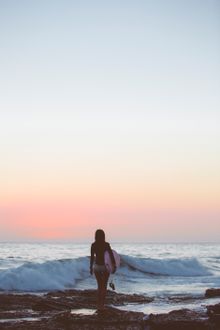 Surfing at sunrise in Currumbin