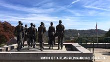 Clinton 12 Statue and Green McAdoo Cultural Center in Clinton