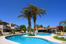The pool at the centre of the 40 bungalow units at the Palm Beach Hotel & Bungalows