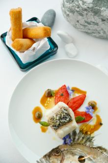 Wild sea bass, confit tomato-olive-panisse