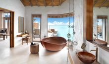 overwater villa bathroom
