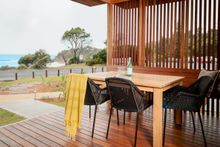 Enjoy a swim followed by breakfast on the verandah at Reflections Holiday Parks Seal Rocks_s
