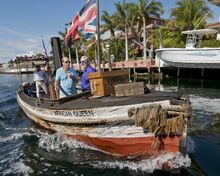 Stephen Bogart, left, son of Humphrey Bogart and Lauren Bacall, chats with movie critic Leonard Maltin while riding the 100-year-old African Queen Friday, May 3, 2013, in Key Largo, Fla. The two men are participating in the inaugural Humphrey Bogart Film 