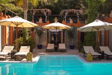 Relax on a sun lounger by the Retreat's beautiful pool 