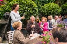 Enjoying a glass of wine in a winery in the Moselle region