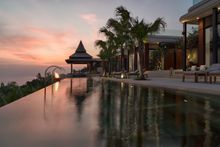 Layan Residences by Anantara pool at sunset
